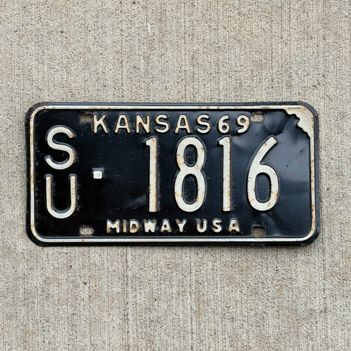 Photo of a 1969 Kansas License Plate Auto Tag Garage Decor Vintage SU 1816 with original patina