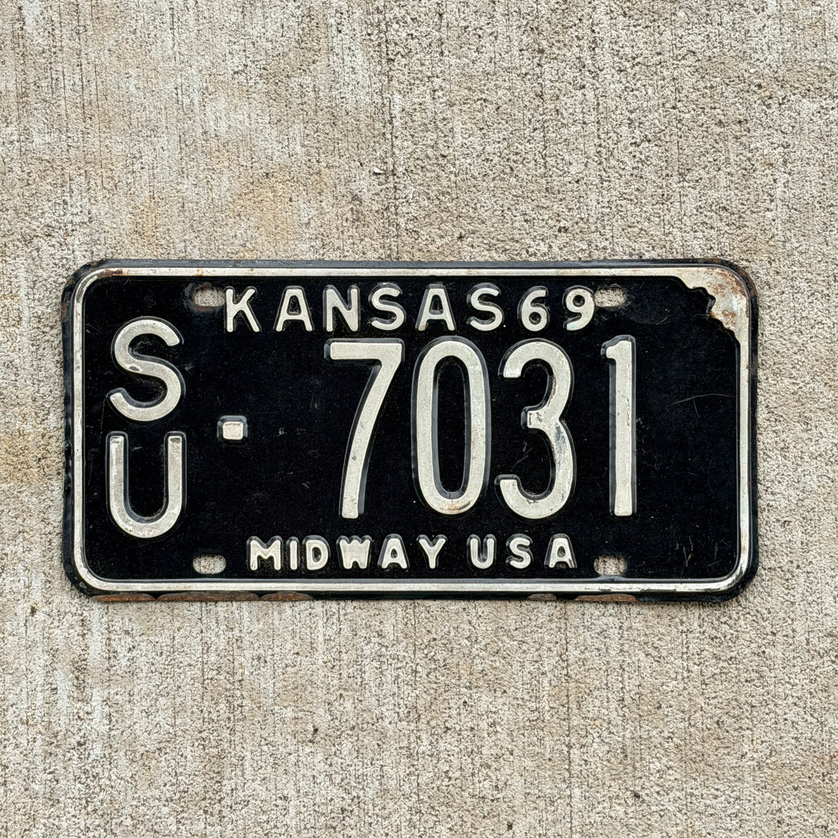 Photo of a 1969 Kansas License Plate Auto Tag Garage Decor Vintage SU 7031 with original patina