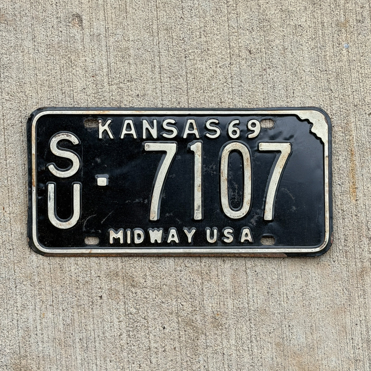 Photo of a 1969 Kansas License Plate Auto Tag Garage Decor Vintage SU 7107 with original patina