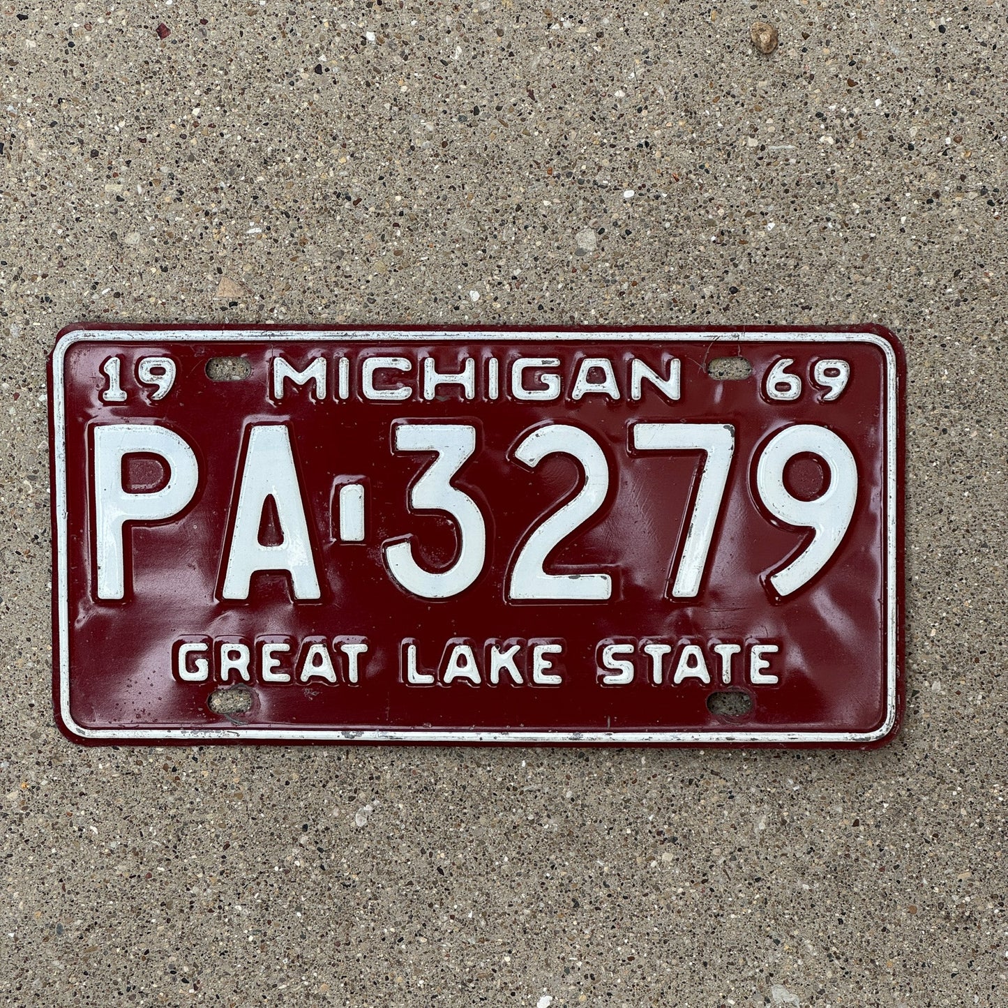 Photo of a 1969 Michigan License Plate Auto Tag Garage Decor Vintage PA 3279
