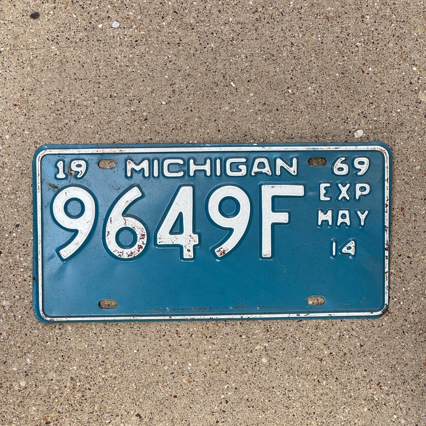 Photo of a 1969 Michigan Truck Half Year License Plate Auto Tag Garage Decor Vintage 9649 F