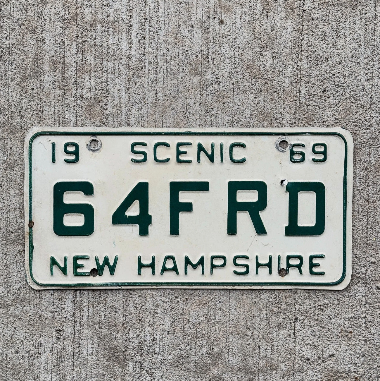 Photo of a 1969 New Hampshire Vanity License Plate Auto Tag Garage Decor Vintage 64 Ford 64 FRD