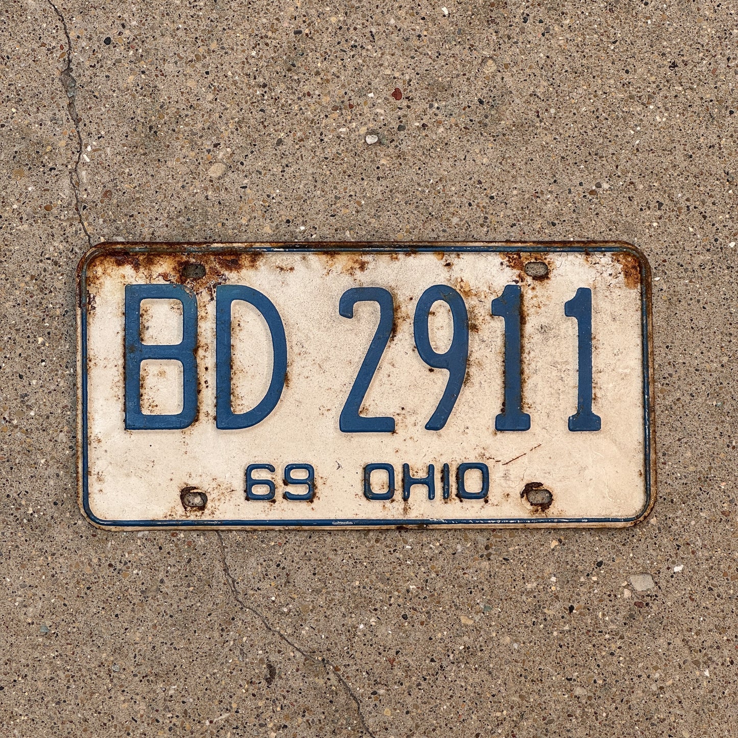 Photo of a 1969 Ohio License Plate Auto Tag 1 Vintage Garage BD 2911 with original patina