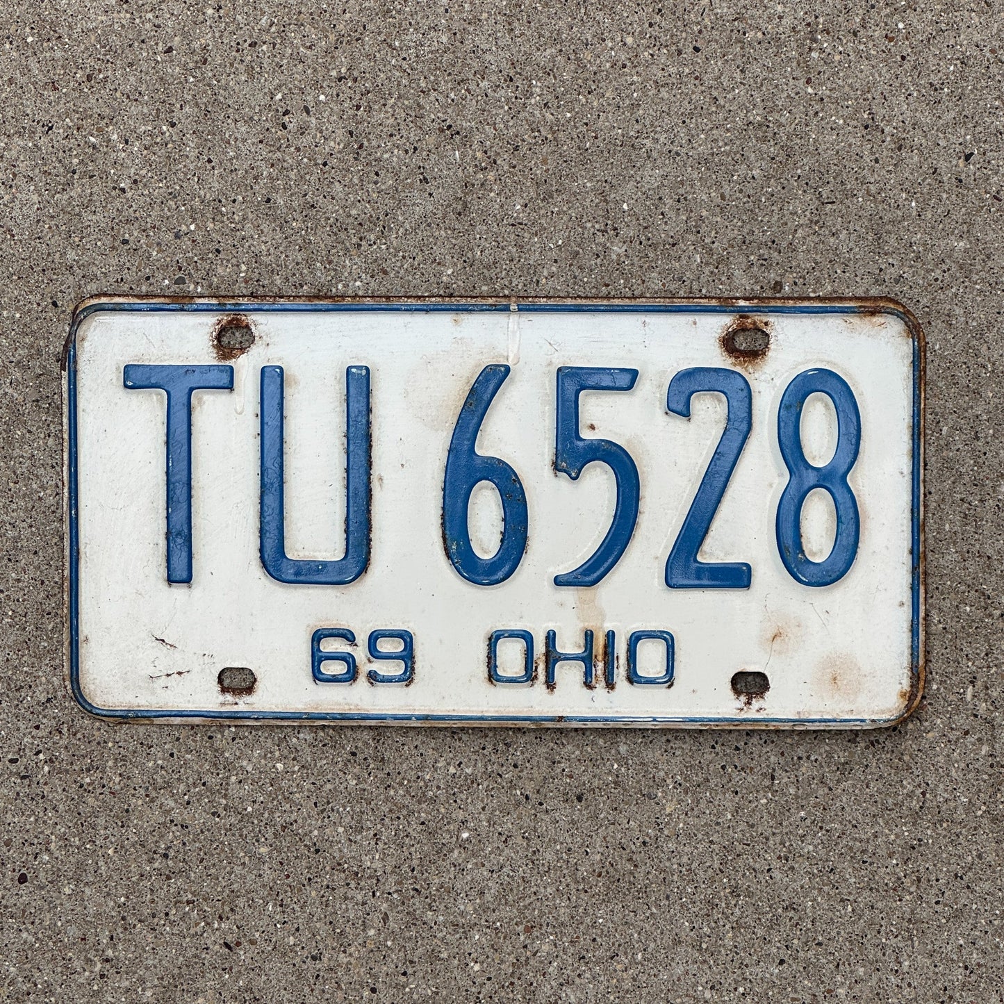 Photo of a 1969 Ohio License Plate Auto Tag Garage Decor Vintage TU 6528 with original patina
