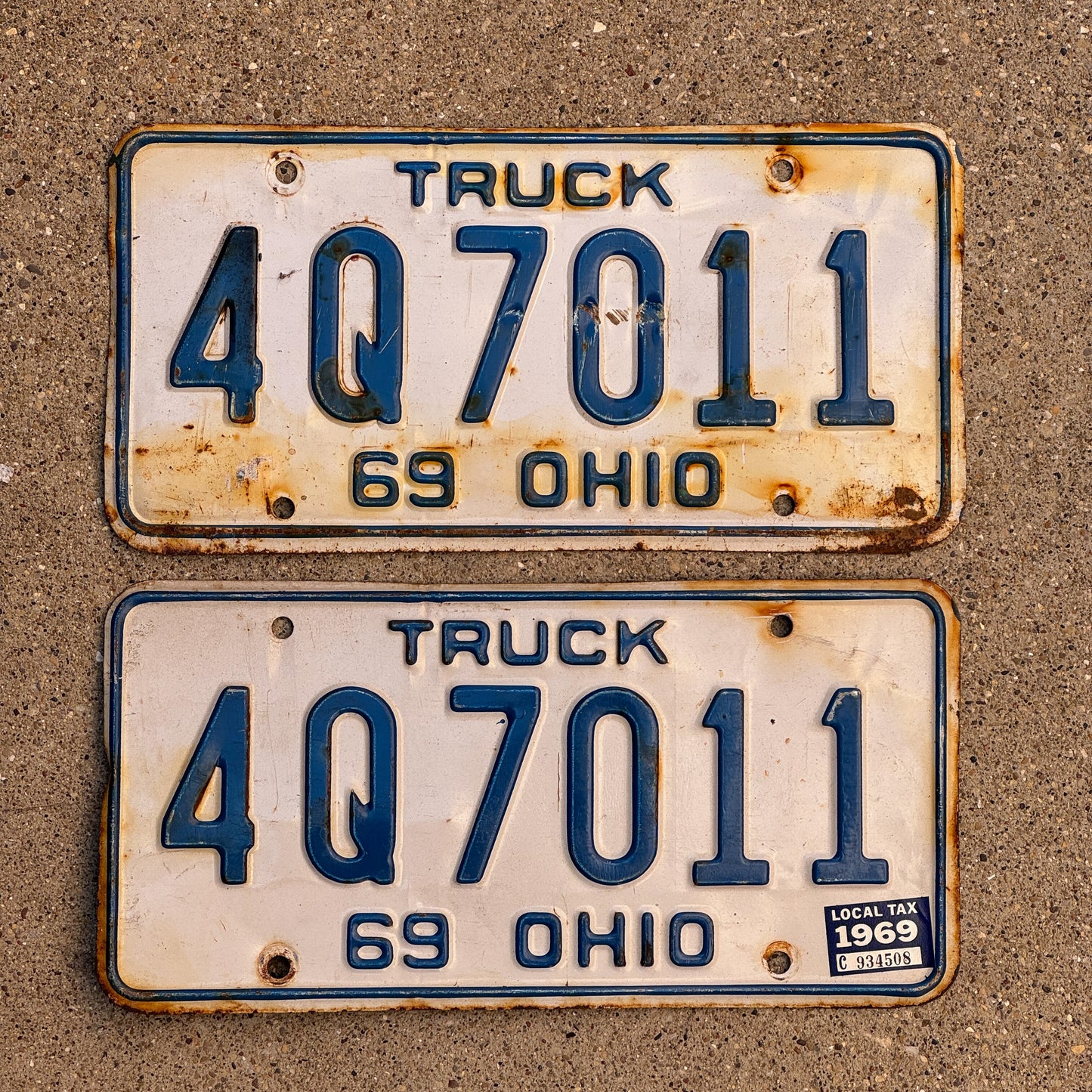 Photo of a 1969 Ohio Truck License Plate Pair Auto Tag Garage Decor Vintage 4 Q 7011 with original patina