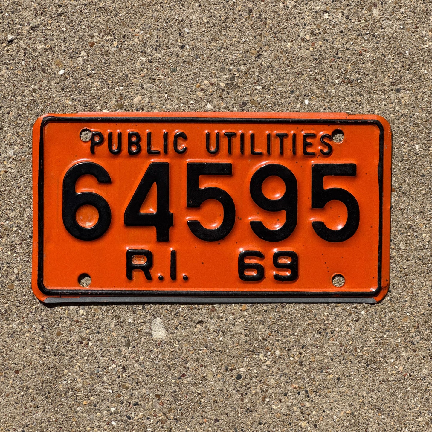 Photo of a 1969 Rhode Island Public Utilities License Plate Auto Tag Garage Decor Vintage Small Oddball 64595