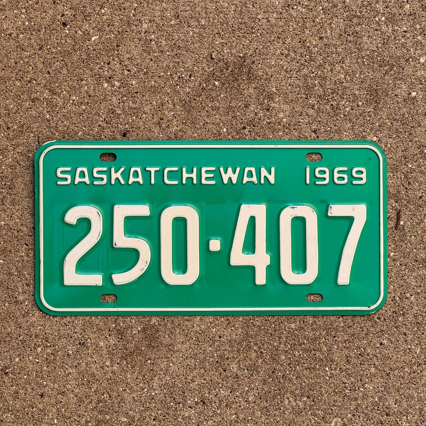 Photo of a 1969 Saskatchewan License Plate Auto Tag Garage Decor Vintage 250 407