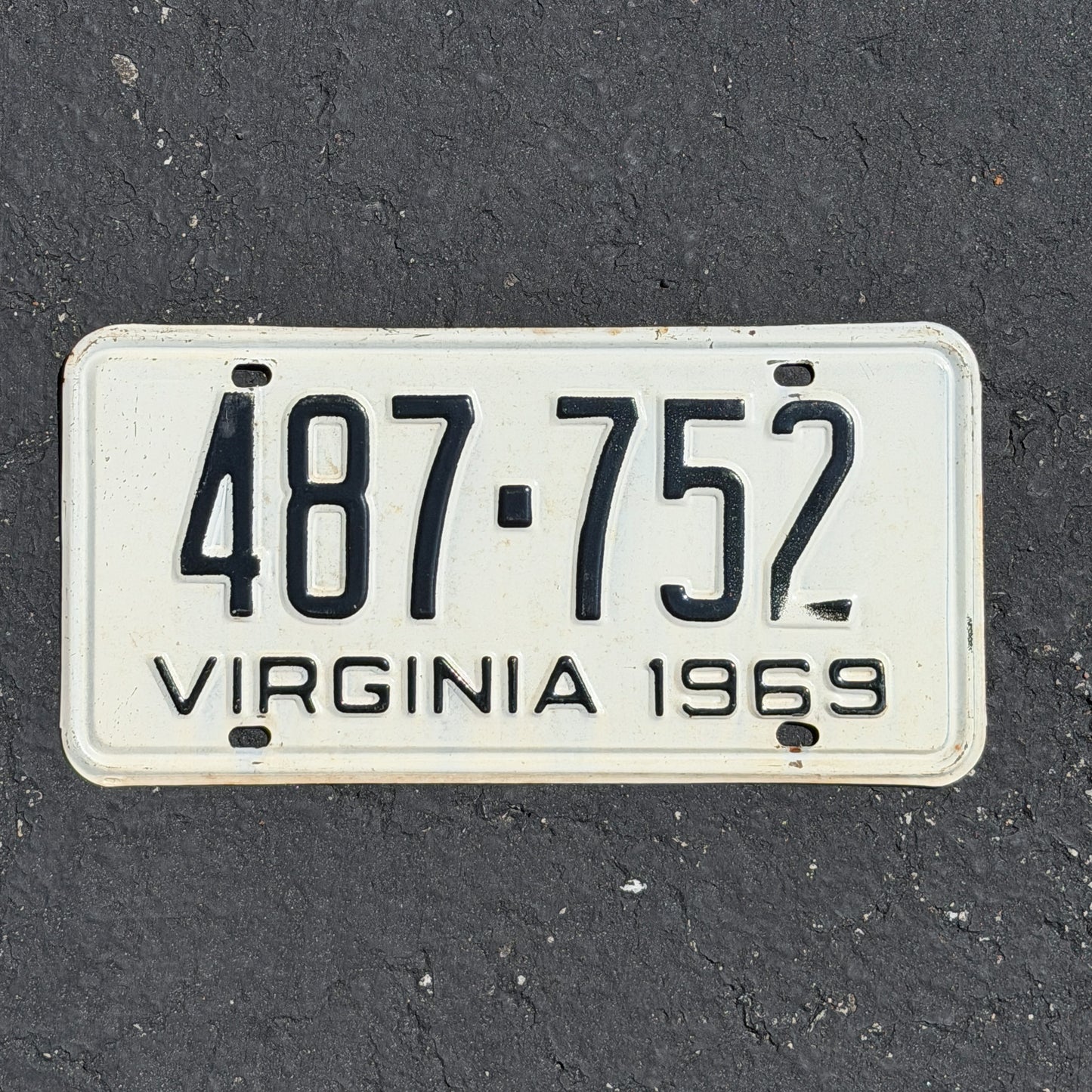 Photo of a 1969 Virginia License Plate Auto Tag Garage Decor Vintage 487 752 with original patina