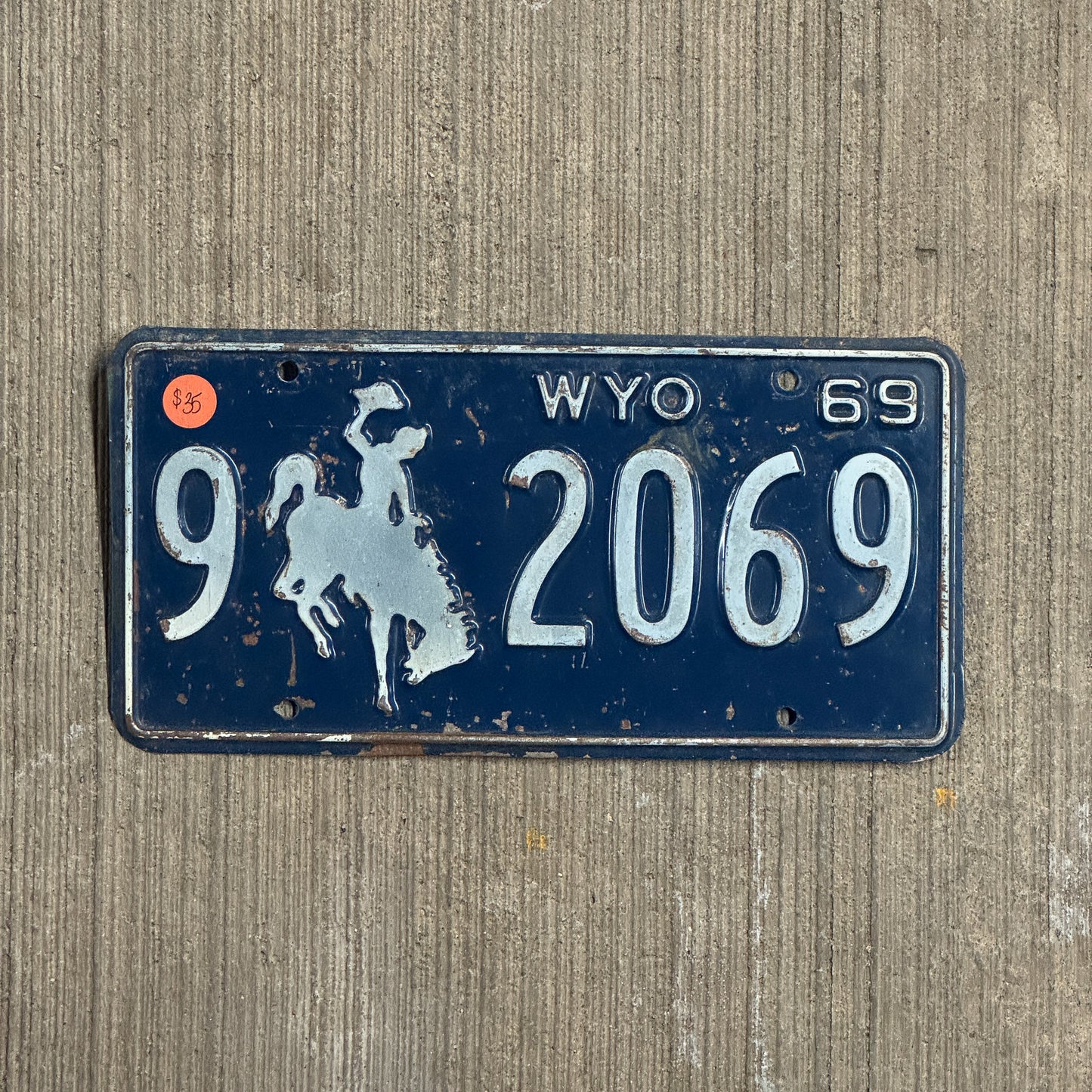 Photo of a 1969 Wyoming License Plate Auto Tag Garage Decor Vintage 9 2069 with original patina