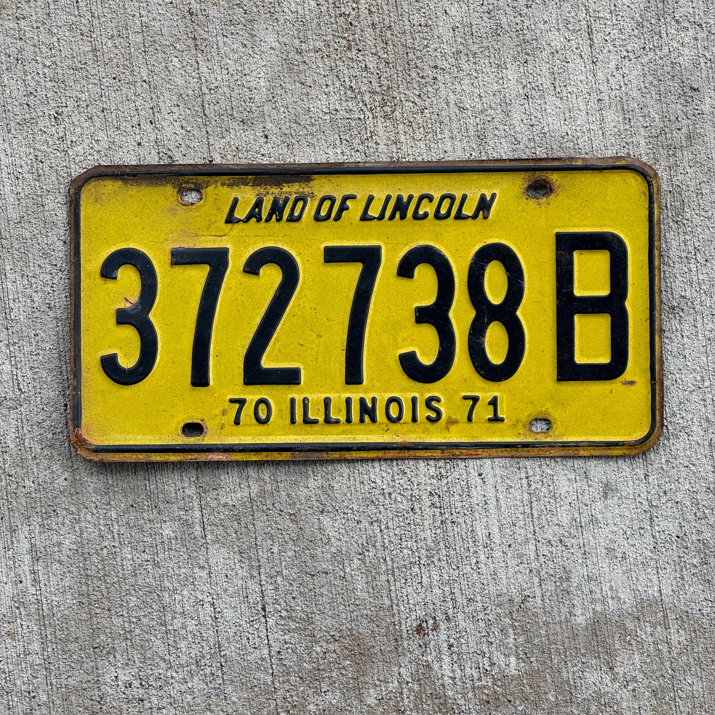 Photo of a 1970 1971 Illinois Truck License Plate Auto Tag 2 Vintage Garage 372 738 B with original patina