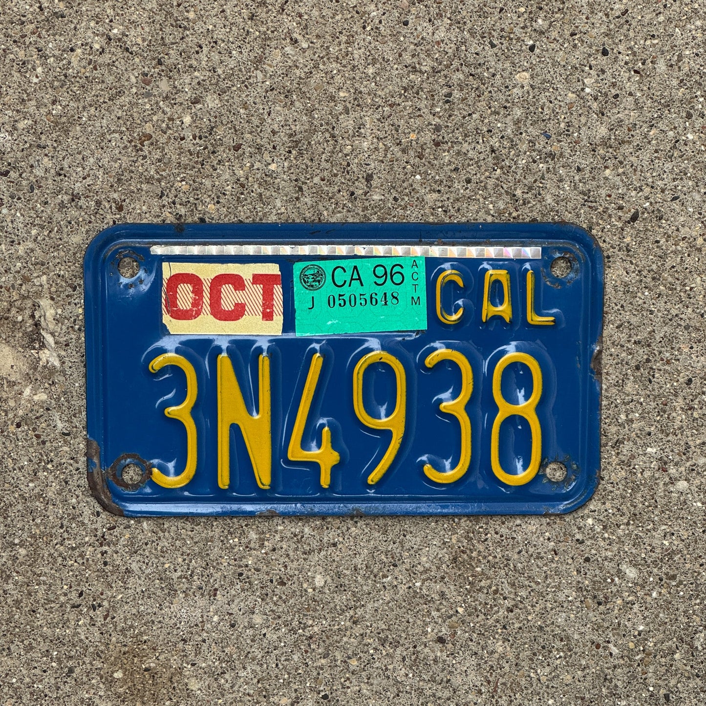 Photo of a 1970 1996 California Motorcycle License Plate Auto Tag Garage Decor Vintage 3N4938 with original patina
