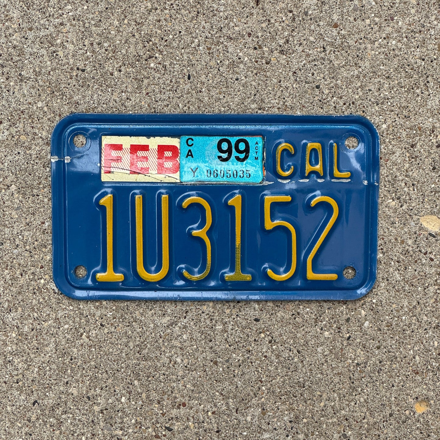 Photo of a 1970 1999 California Motorcycle License Plate Auto Tag Garage Decor Vintage 1U3152 with original patina