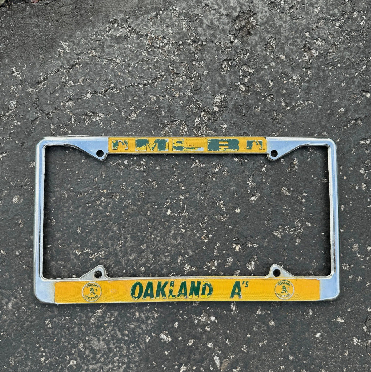 Photo of a 1970 Era California License Plate Frame Auto Tag Garage Decor Vintage Oakland A's MLB Athletics Chrome Metal