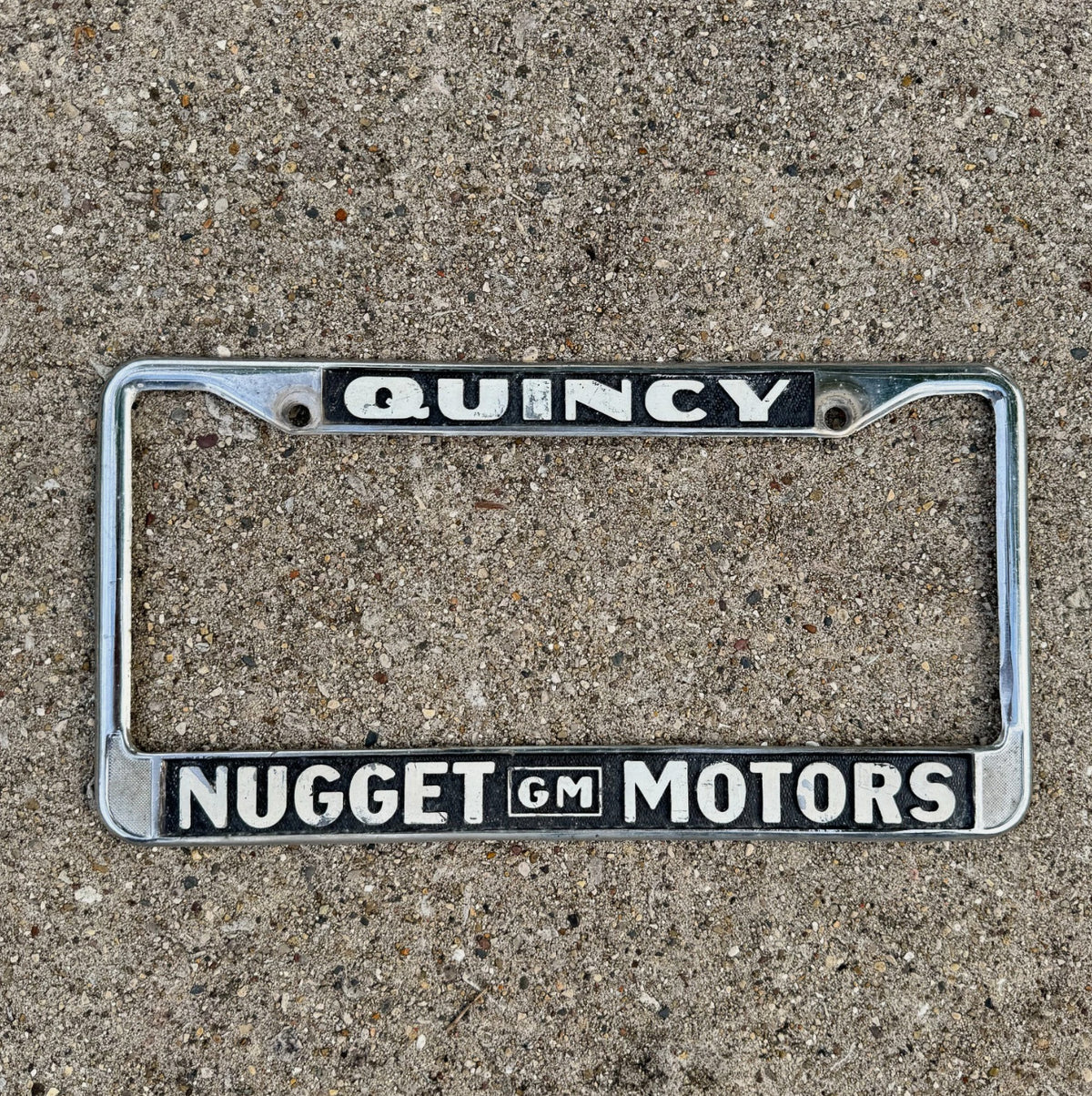 1970 Era Qunicy California License Plate Frame Auto Tag Nugget Motors GM