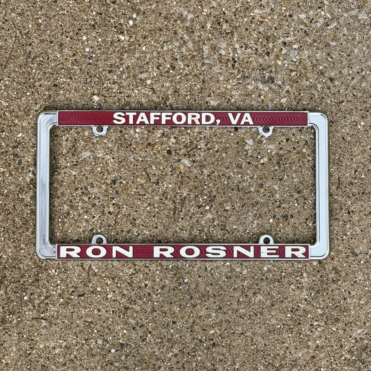 Photo of a 1970 Era Stafford Virginia License Plate Frame Auto Tag Garage Decor Vintage Ron Rosner Toyota Metal with original patina
