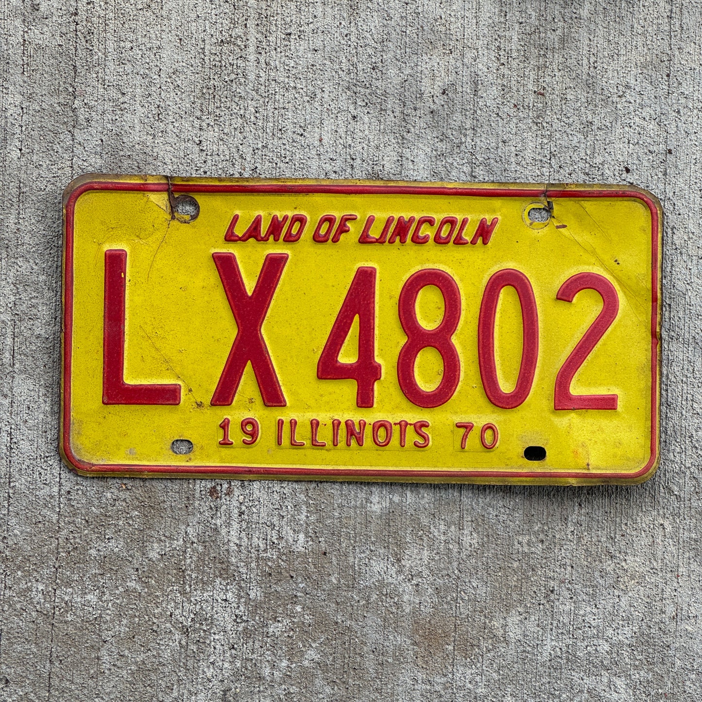 Photo of a 1970 Illinois License Plate Auto Tag 2 Vintage Garage LX 4802 with original patina