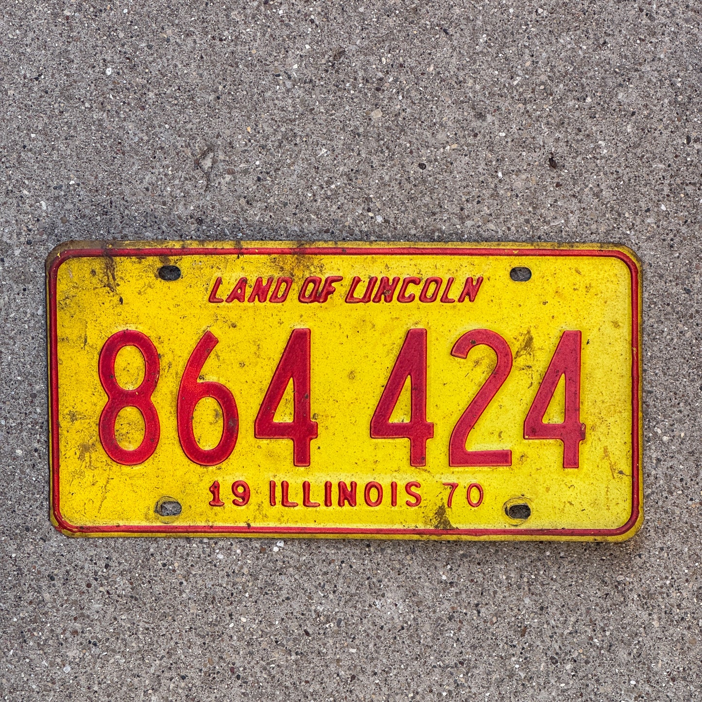 Photo of a 1970 Illinois License Plate Auto Tag Garage Decor Vintage 864 424 with original patina