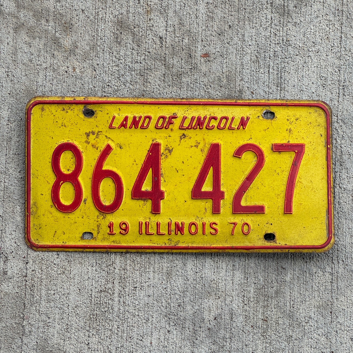 Photo of a 1970 Illinois License Plate Auto Tag Garage Decor Vintage 864 427 with original patina