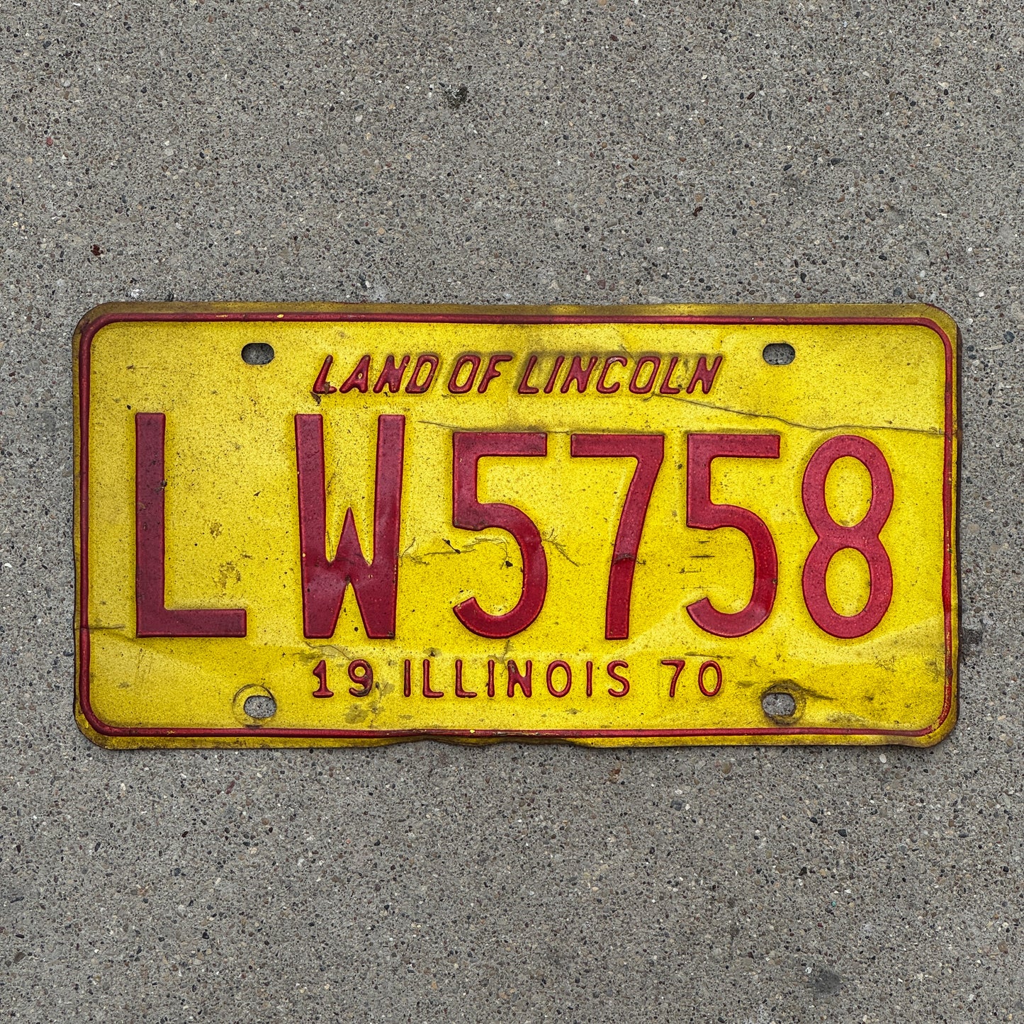 Photo of a 1970 Illinois License Plate Auto Tag Garage Decor Vintage LW 5758 with original patina