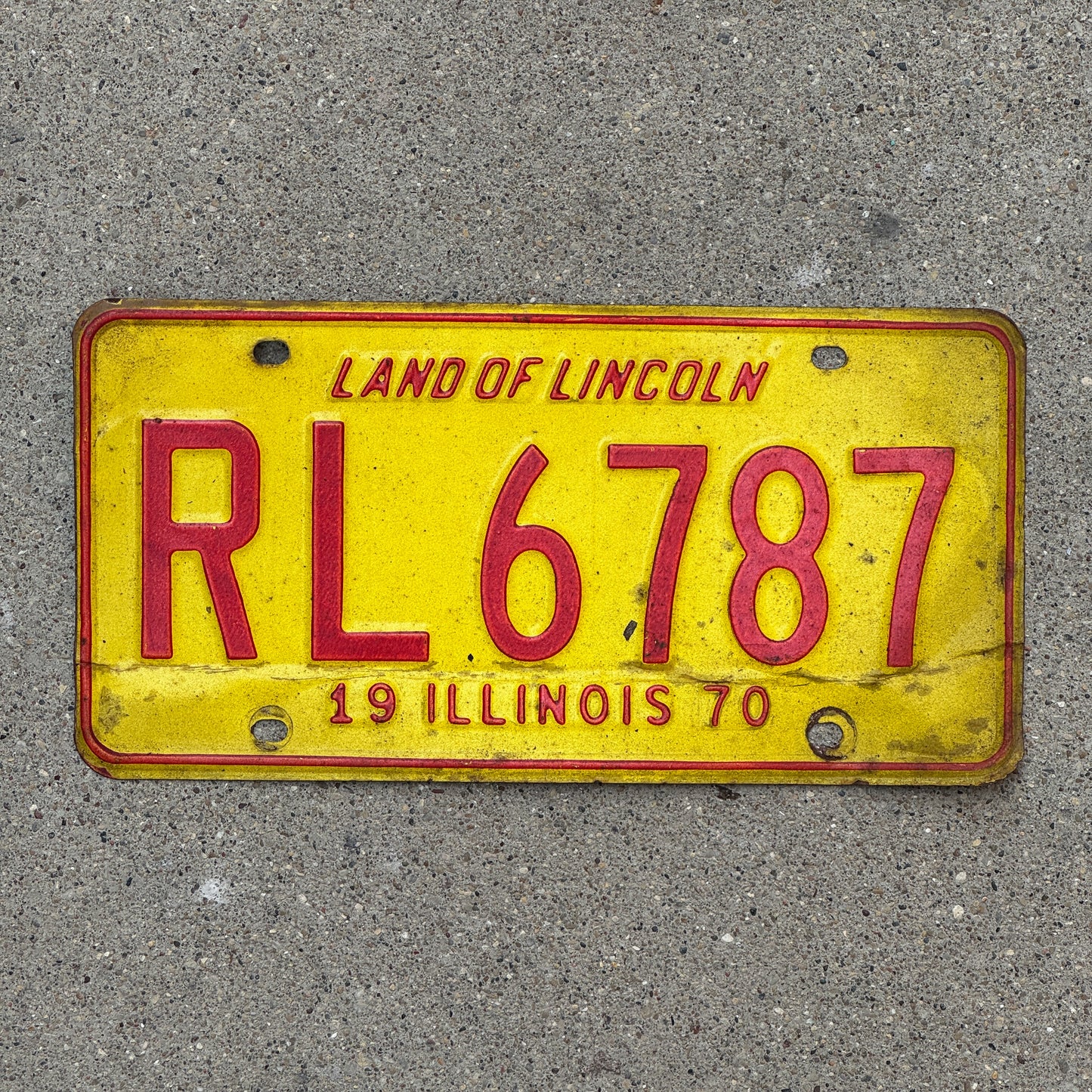 Photo of a 1970 Illinois License Plate Auto Tag Garage Decor Vintage RL 6787 with original patina