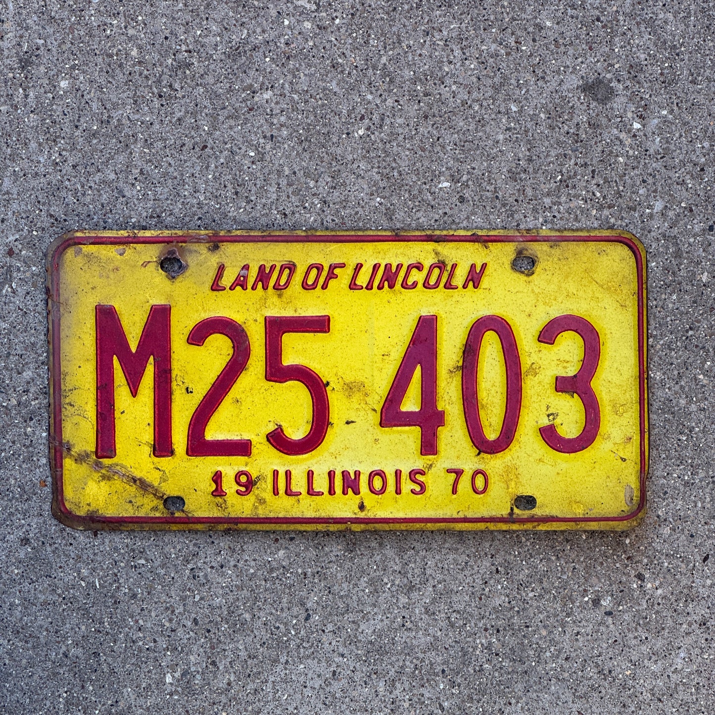 Photo of a 1970 Illinois Municipal License Plate Auto Tag 2 Vintage Garage M 25 403 with original patina