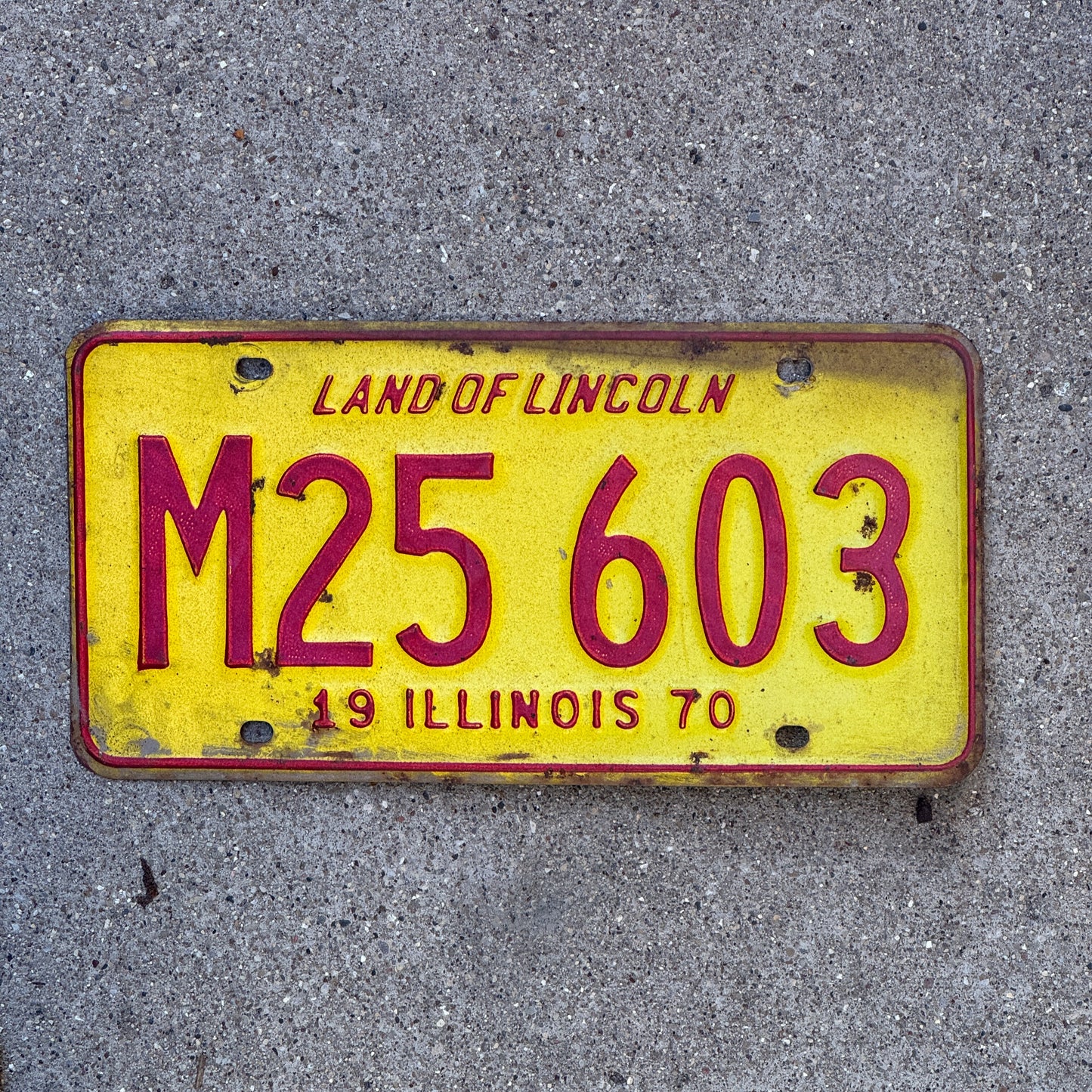 Photo of a 1970 Illinois Municipal License Plate Auto Tag 2 Vintage Garage M 25 603 with original patina