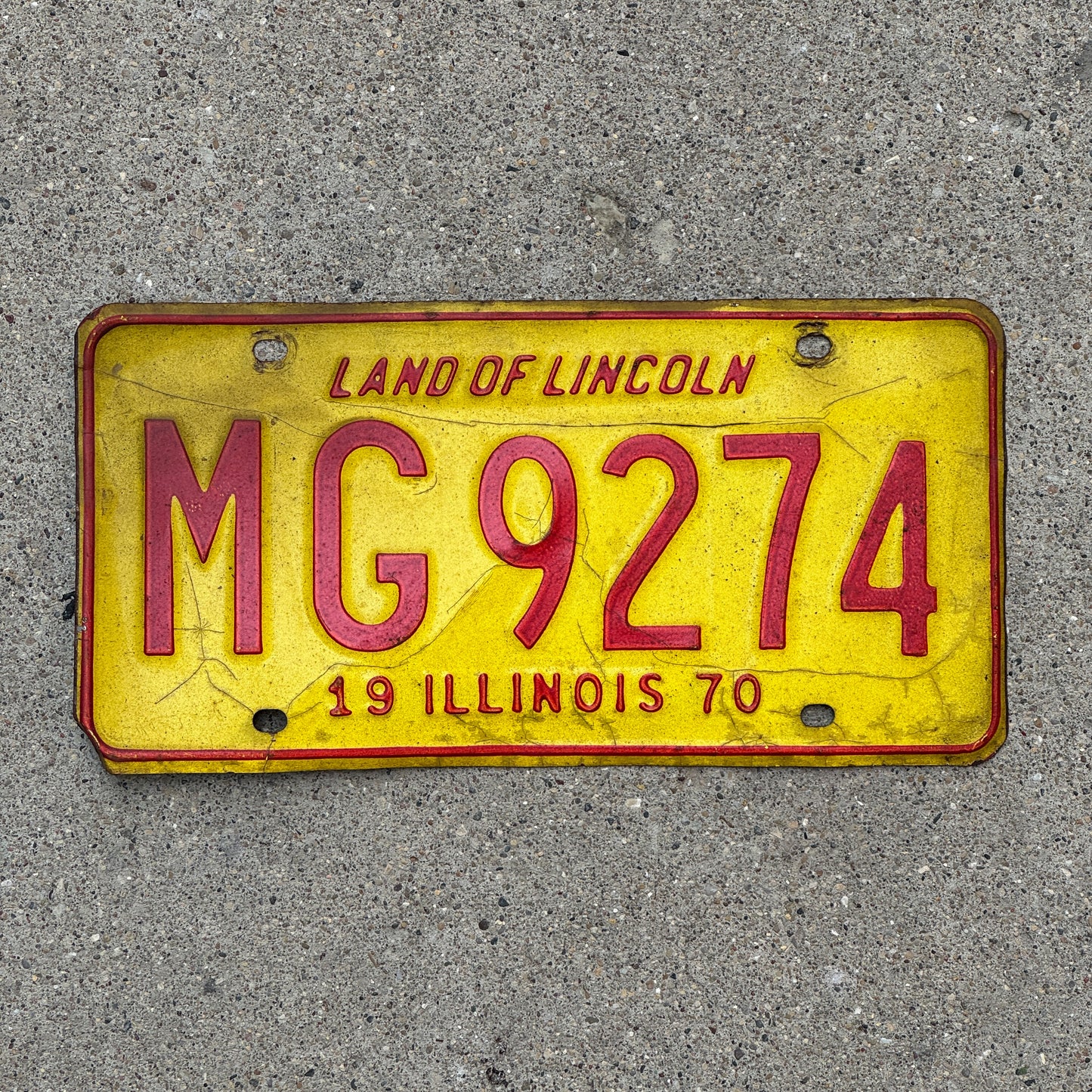 Photo of a 1970 Illinois Truck Mileage Tax License Plate Auto Tag 1 Vintage Garage MG 9274 with original patina