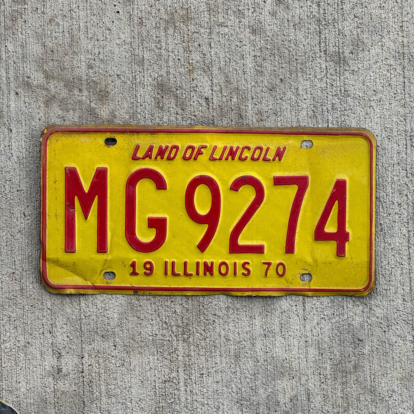 Photo of a 1970 Illinois Truck Mileage Tax License Plate Auto Tag 2 Vintage Garage MG 9274 with original patina