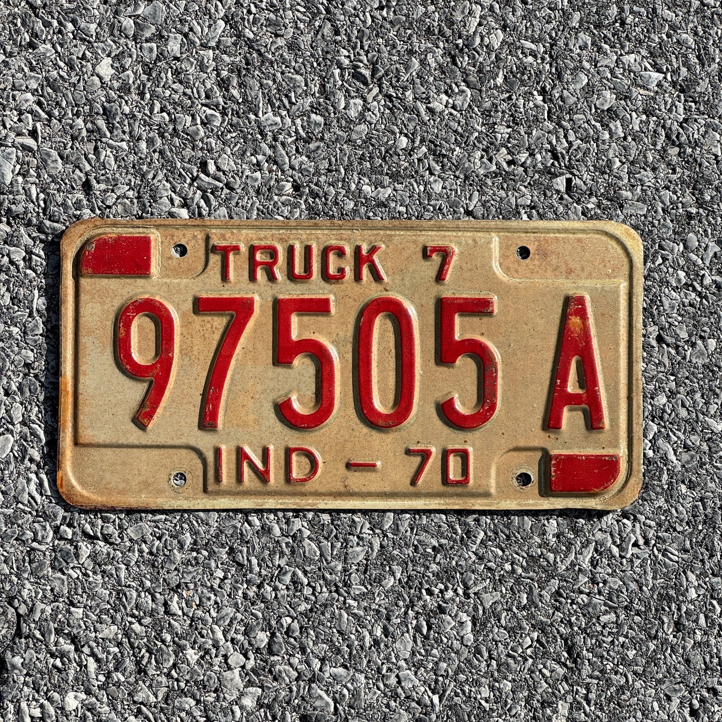 Photo of a 1970 Indiana Truck License Plate Auto Tag Garage Decor Vintage 97505A