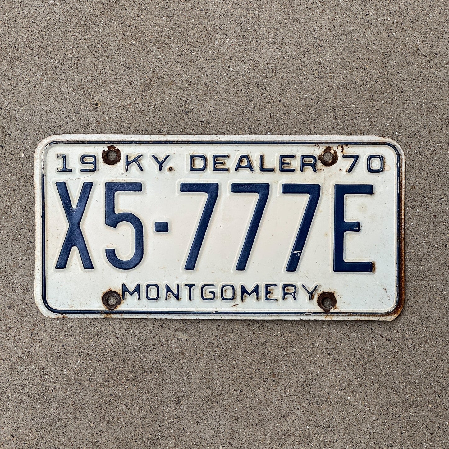 Photo of a 1970 Kentucky Dealer License Plate Auto Tag Garage Decor Vintage Repeat Repeating X5 777 E