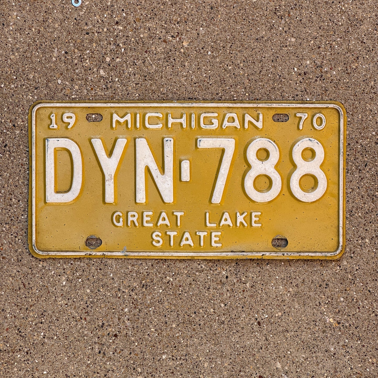Photo of a 1970 Michigan License Plate Auto Tag 1 Garage Decor DYN 788