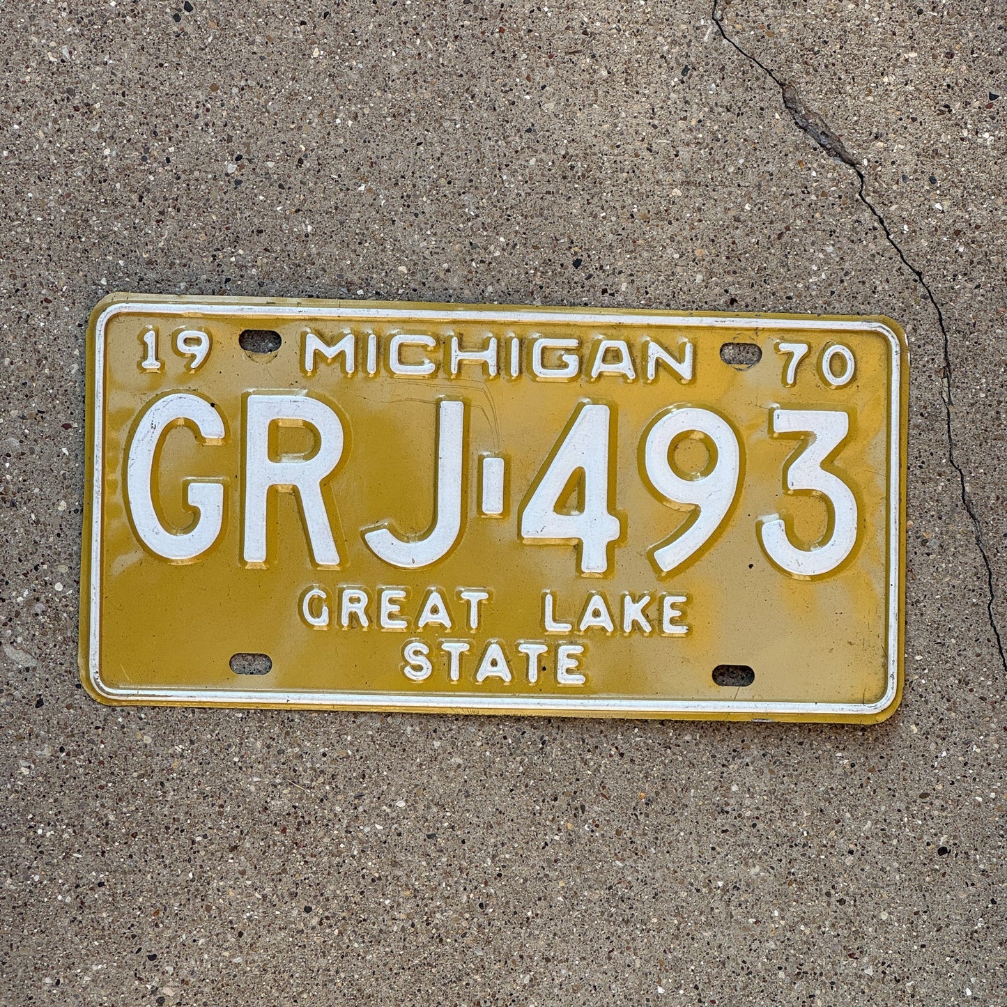 Photo of a 1970 Michigan License Plate Auto Tag 2 Garage Decor GRJ 493