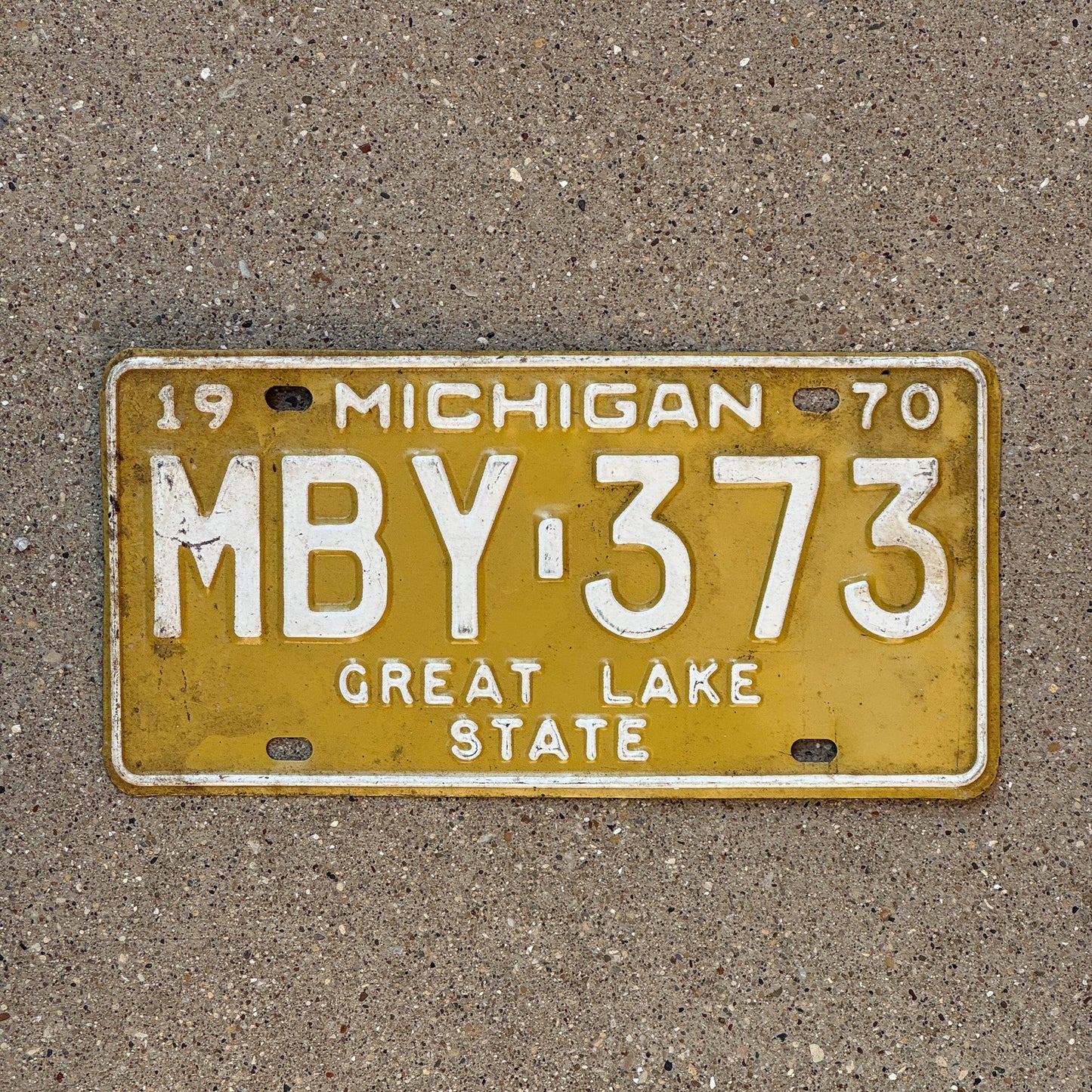 Photo of a 1970 Michigan License Plate Auto Tag Garage Decor Vintage MBY 373