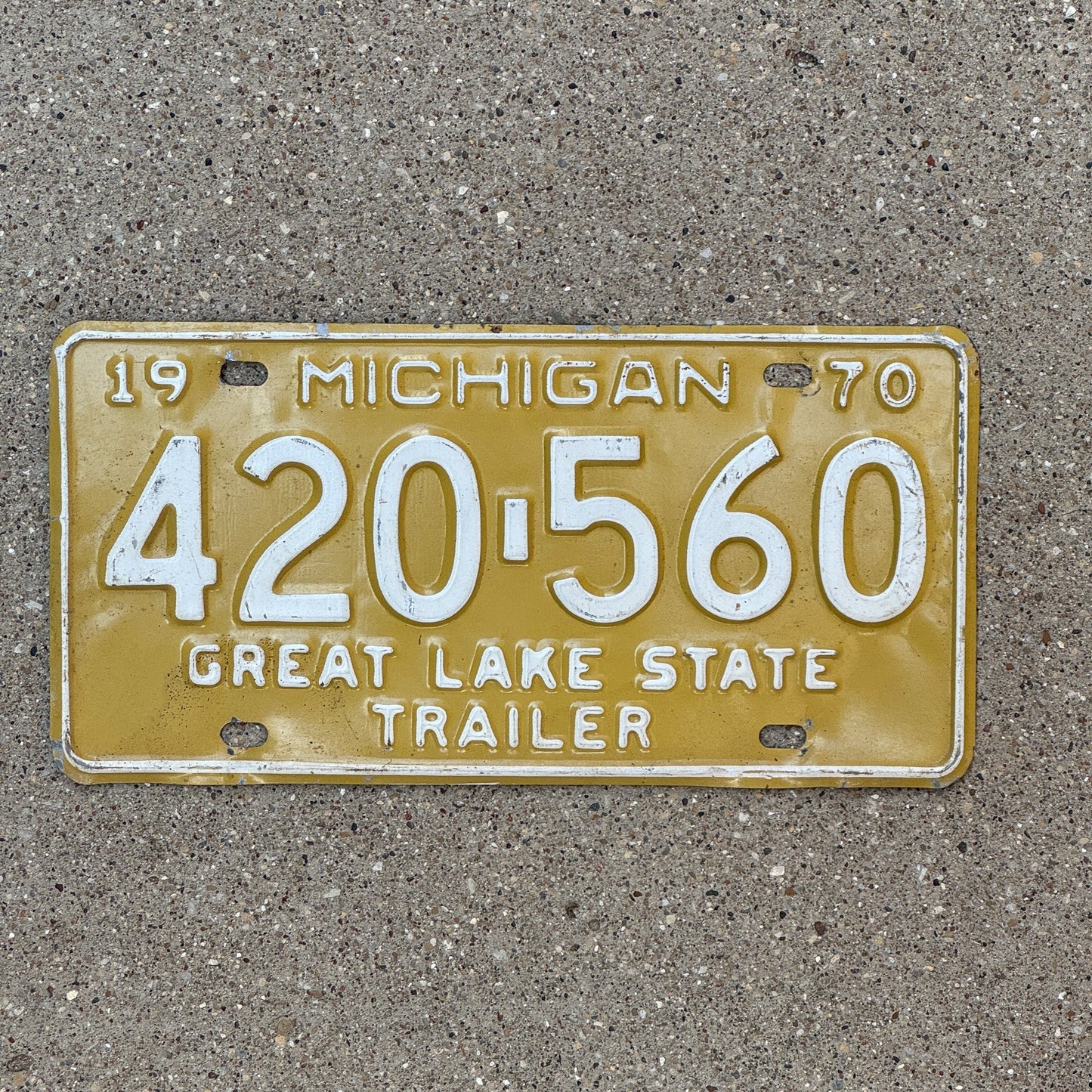 Photo of a 1970 Michigan Trailer License Plate Auto Tag Garage Decor Vintage Weed Smoking 420 560
