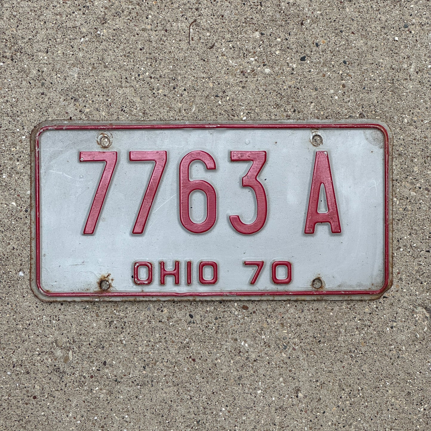 Photo of a 1970 Ohio License Plate Auto Tag Garage Decor Vintage 7763 A with original patina