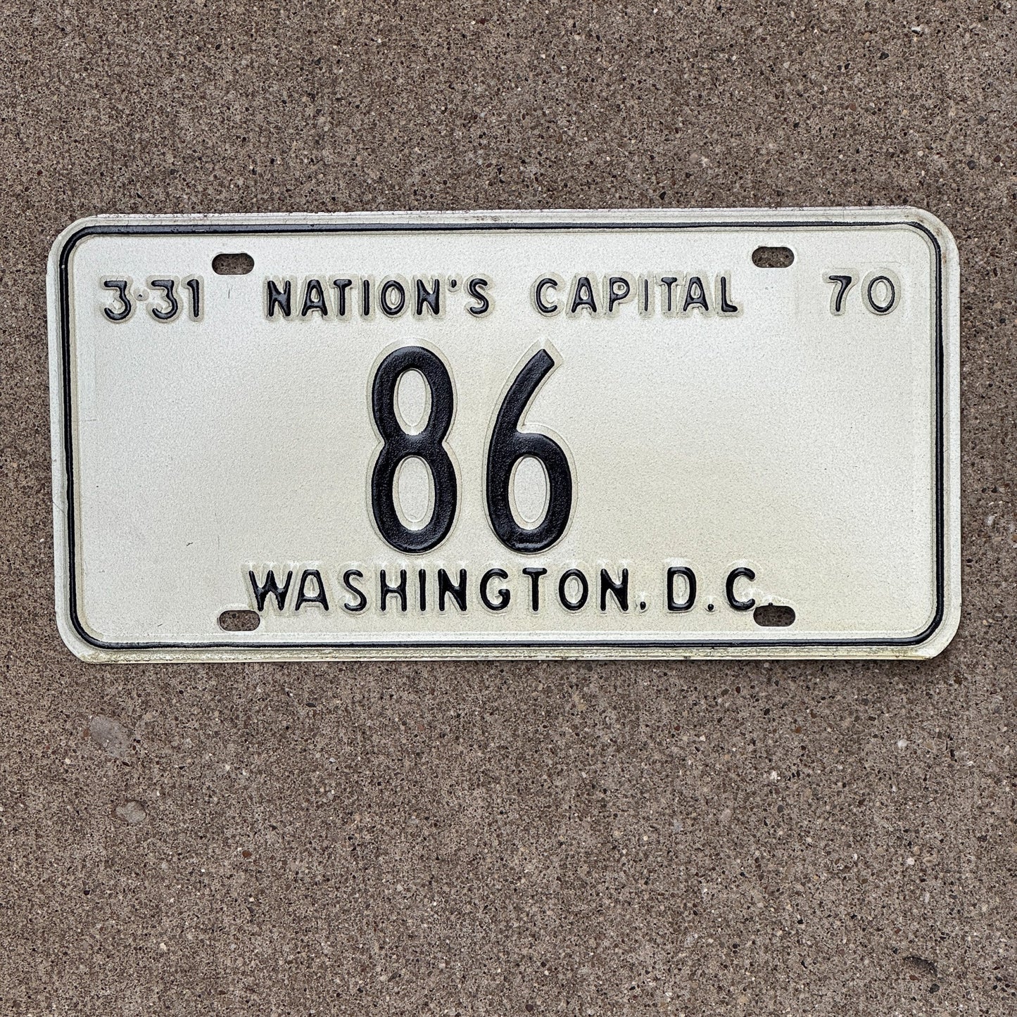 Photo of a 1970 Washington DC License Plate Auto Tag 1 Garage Decor Low Number Two Digit 86 with original patina