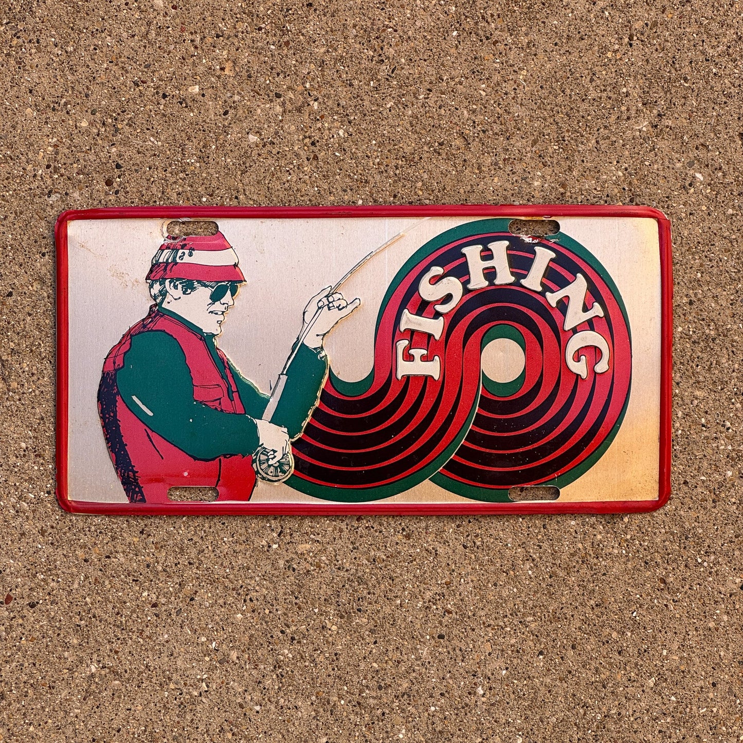 Photo of a 1970s Era Booster License Plate Auto Tag Garage Decor Vintage Retro 1970s Aluminum Retro Fisherman Fishing