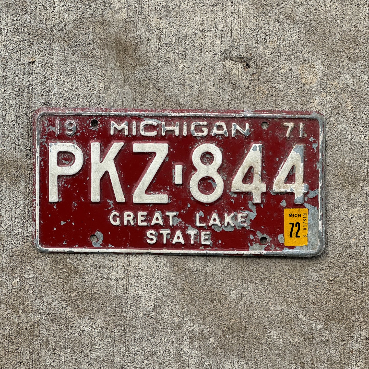 Photo of a 1971 1972 Michigan License Plate Auto Tag Garage Decor Vintage PKZ 844 with original patina