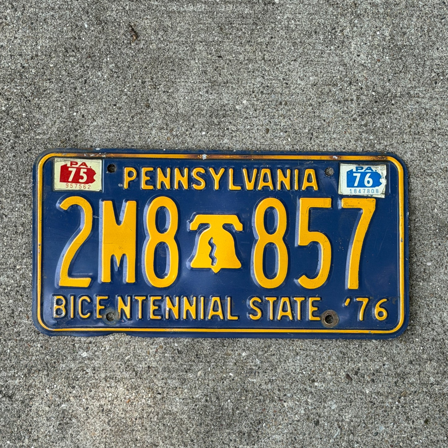 Photo of a 1971 1976 Pennsylvania License Plate Auto Tag Garage Decor Vintage Bicentennial Liberty Bell 2M8 857 with original patina