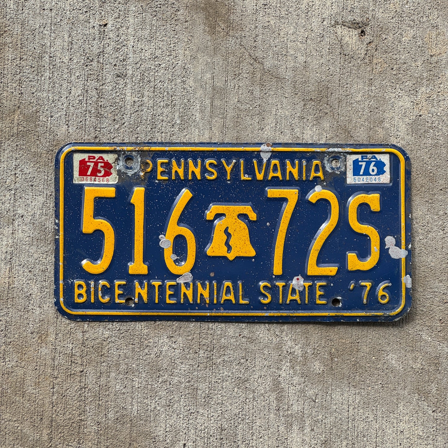 Photo of a 1971 1976 Pennsylvania License Plate Auto Tag Garage Decor Vintage Bicentennial Liberty Bell 516 72S with original patina