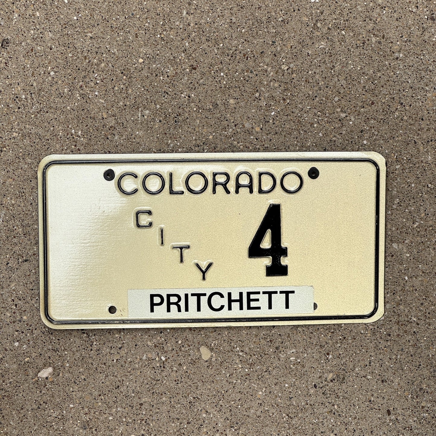 Photo of a 1971 Colorado City License Plate Auto Tag Garage Decor Vintage Pritchett County Single Digit 4