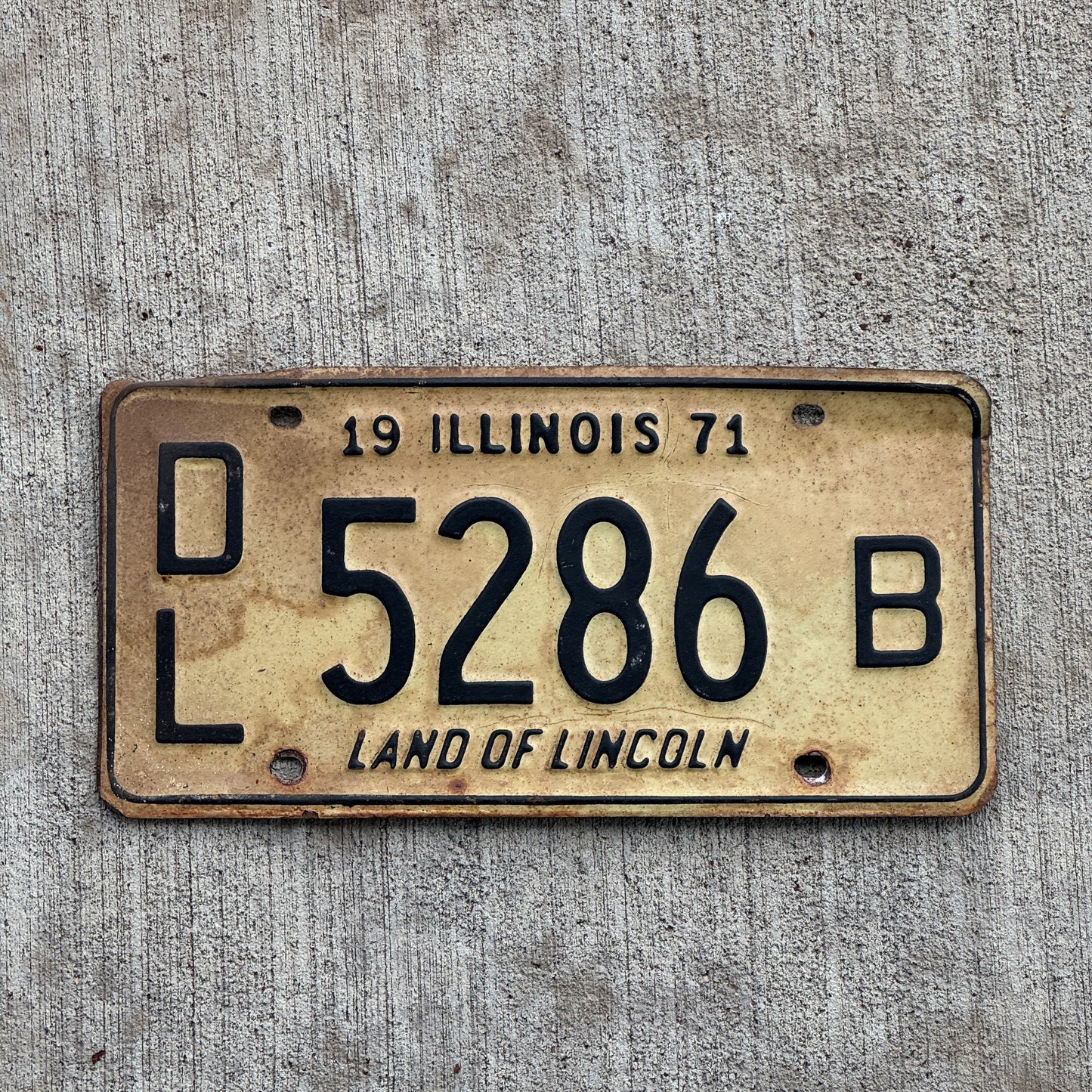 Photo of a 1971 Illinois Dealer License Plate Auto Tag 1 Vintage Garage 5286 B with original patina