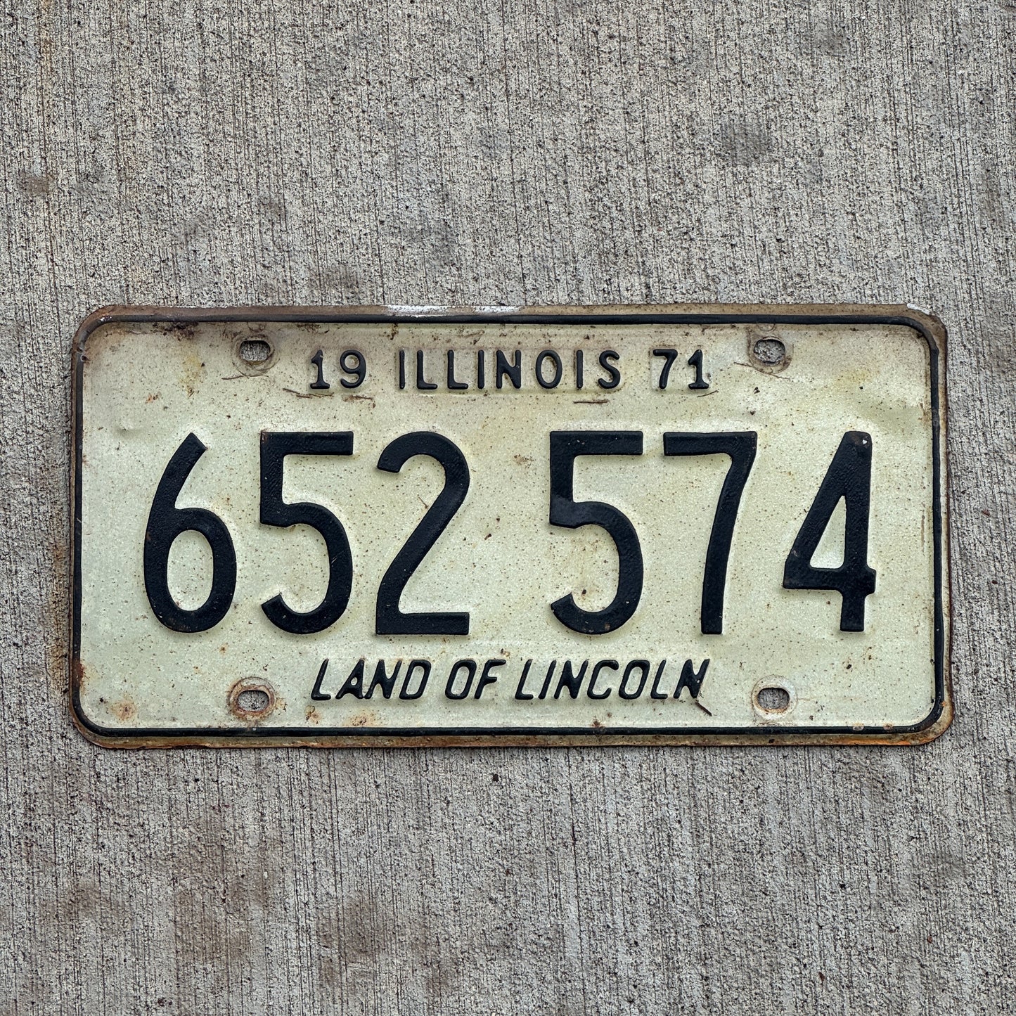 Photo of a 1971 Illinois License Plate Auto Tag 2 Vintage Garage 652 574 with original patina