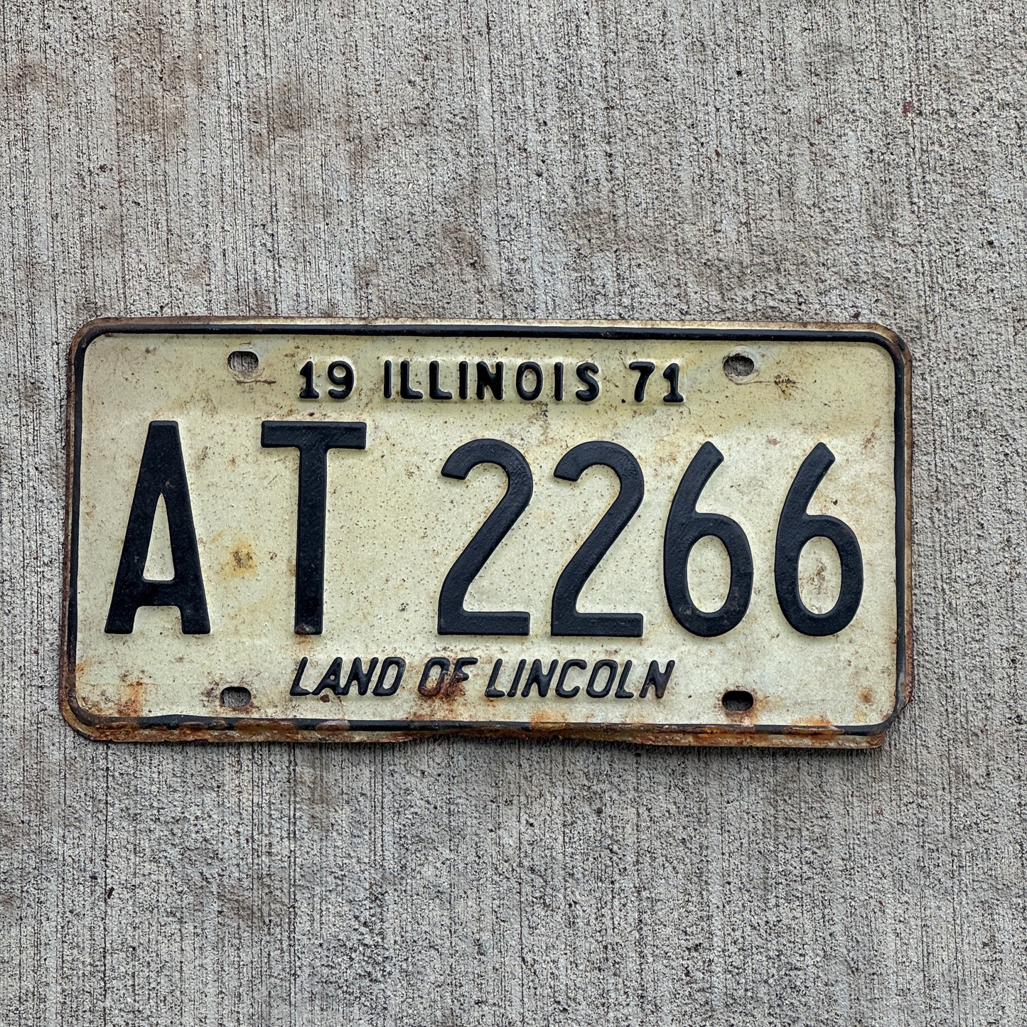 Photo of a 1971 Illinois License Plate Auto Tag 2 Vintage Garage AT 2266 with original patina