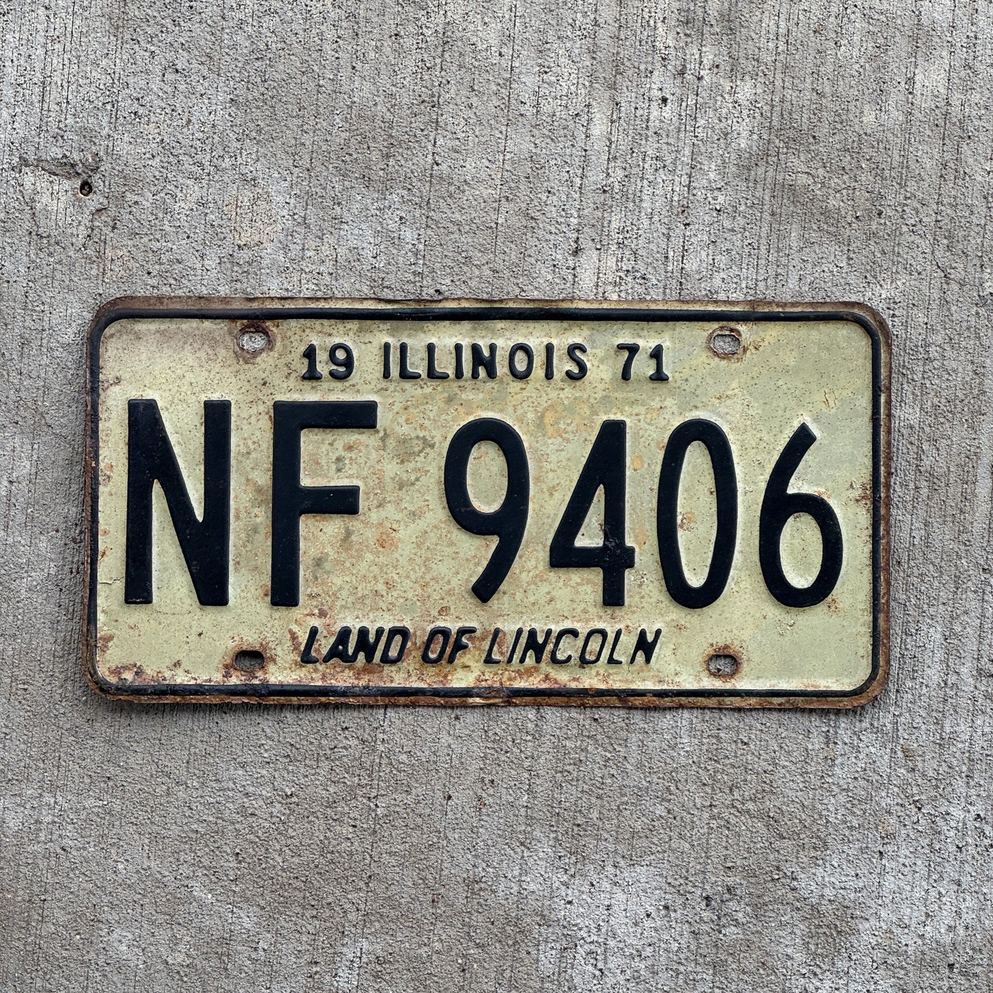 Photo of a 1971 Illinois License Plate Auto Tag 2 Vintage Garage NF 9406 with original patina