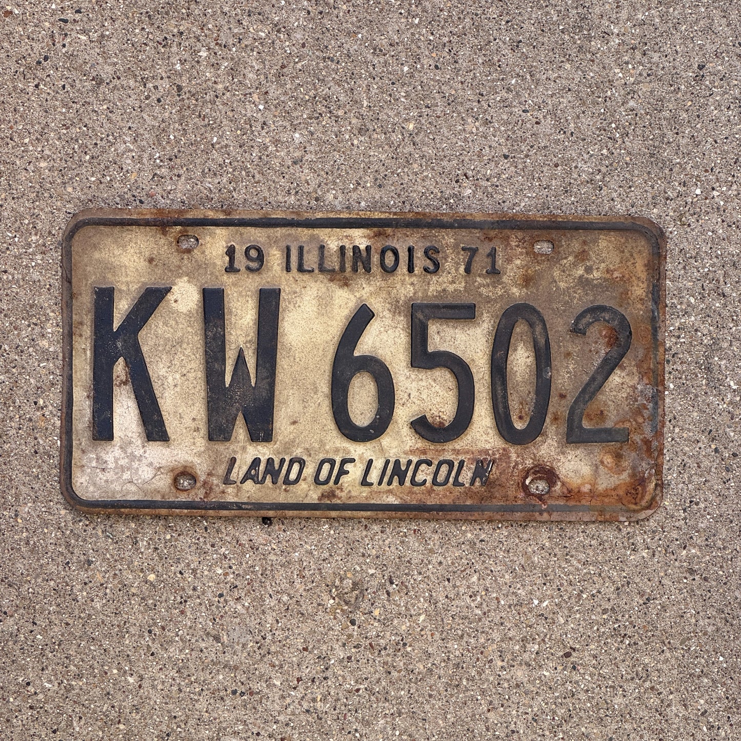 Photo of a 1971 Illinois License Plate Auto Tag Garage Decor Vintage KW 6502 with original patina