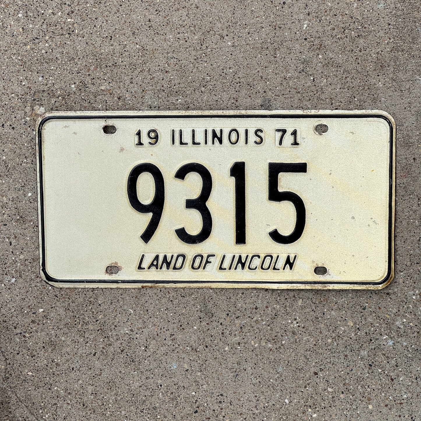 Photo of a 1971 Illinois License Plate Auto Tag Garage Decor Vintage Low Number Four Digit 9315 with original patina