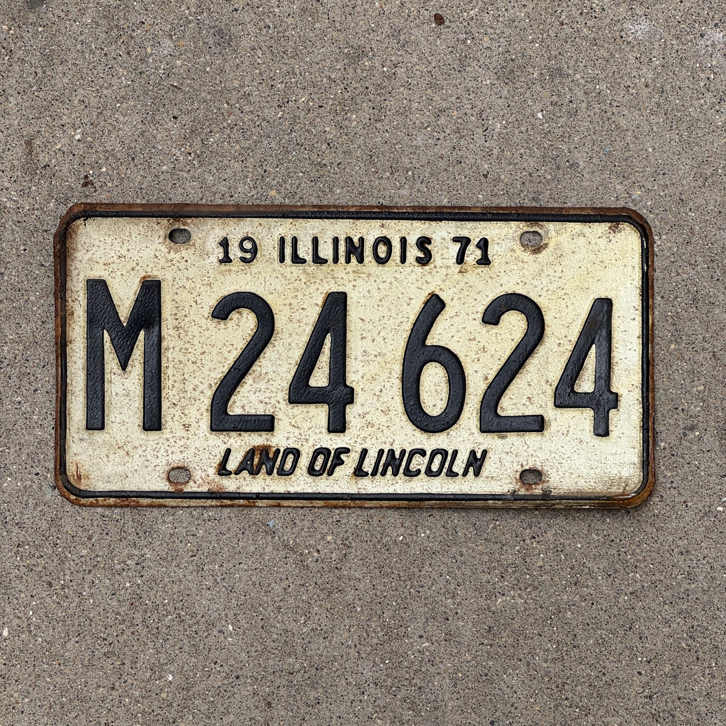 Photo of a 1971 Illinois Municipal License Plate Auto Tag 1 Vintage Garage M 24 624 with original patina