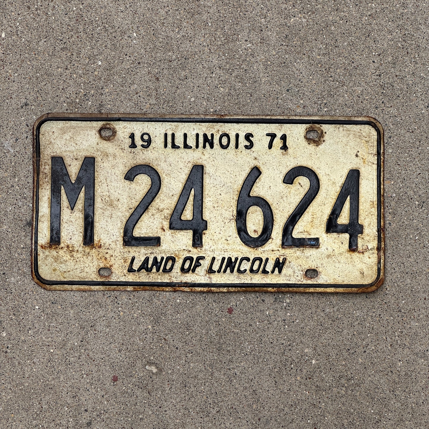 Photo of a 1971 Illinois Municipal License Plate Auto Tag 2 Vintage Garage M 24 624 with original patina