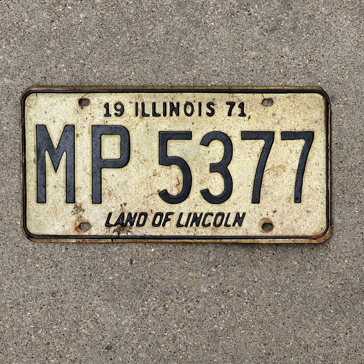 Photo of a 1971 Illinois Truck Mileage Tax License Plate Auto Tag 1 Vintage Garage MP 5377 with original patina